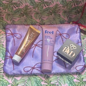 Ipsy Purple Bow Cosmetic Bag with Skincare Cosmetic Products